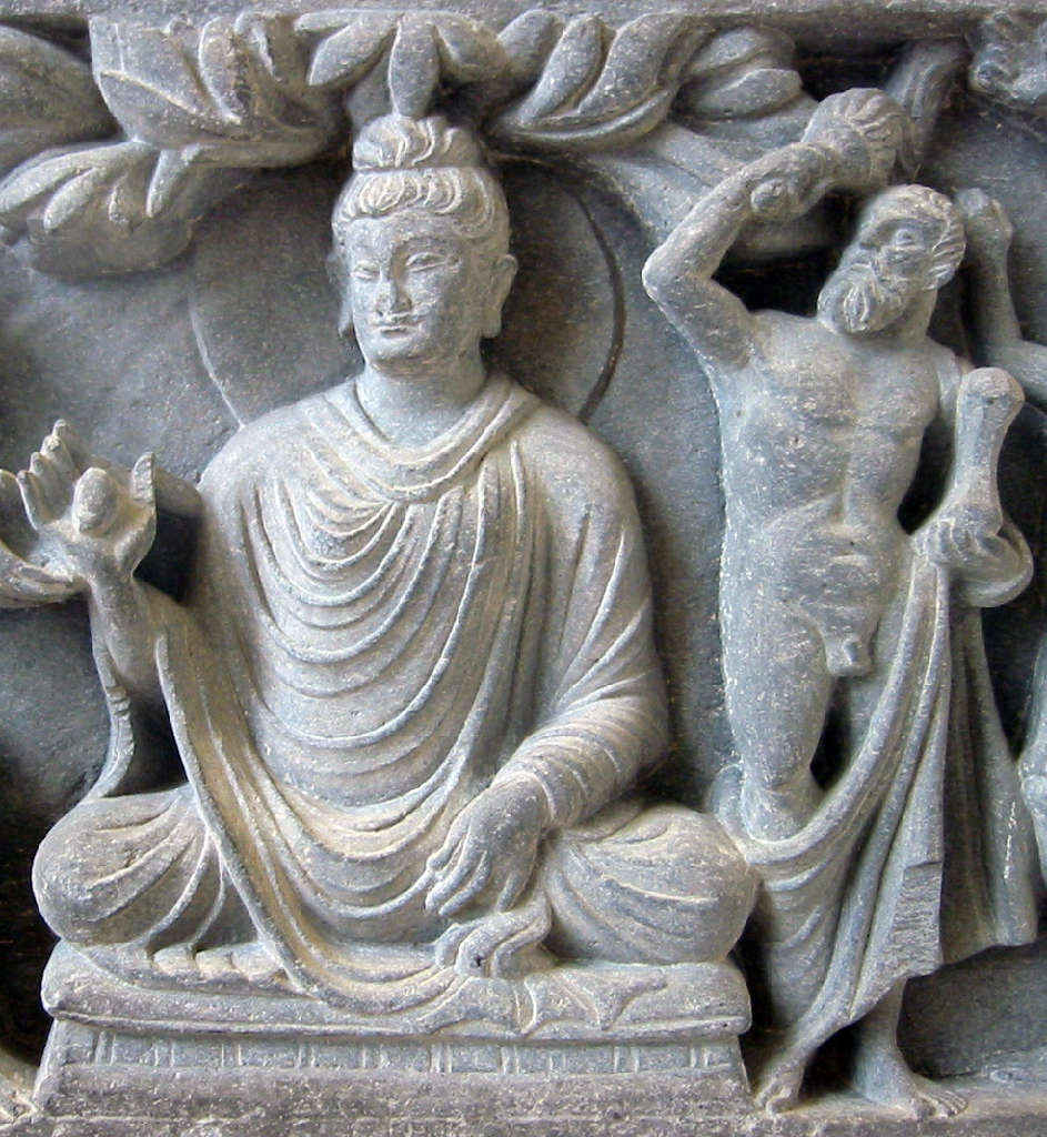 Herculean depiction of Vajrapani (right), as the protector of the Buddha, 2nd century CE Gandhara, British Museum.