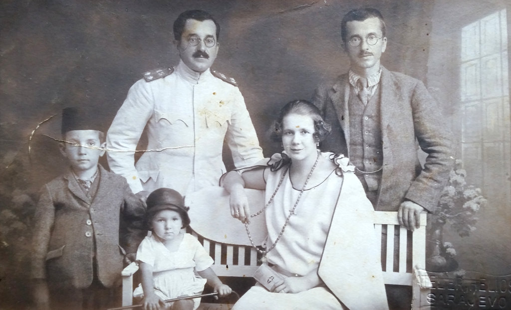 Old Bosnian family photo, taken in a 1920's Sarajevo photo studio of Đumišić family.