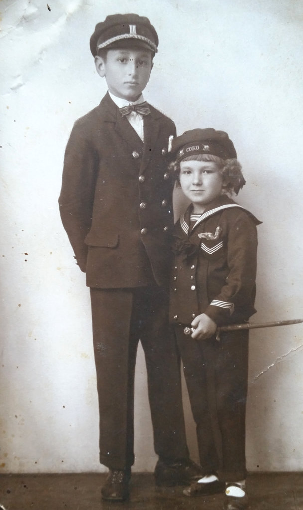 Old Bosnian family photo, taken in a 1920's Sarajevo photo studio of Đumišić family.