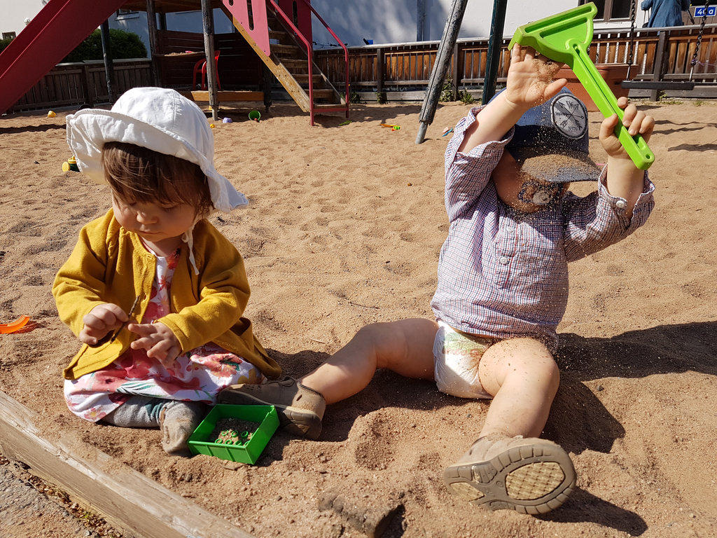 Babies playing in the sand. Photo: Sanjin Đumišić.