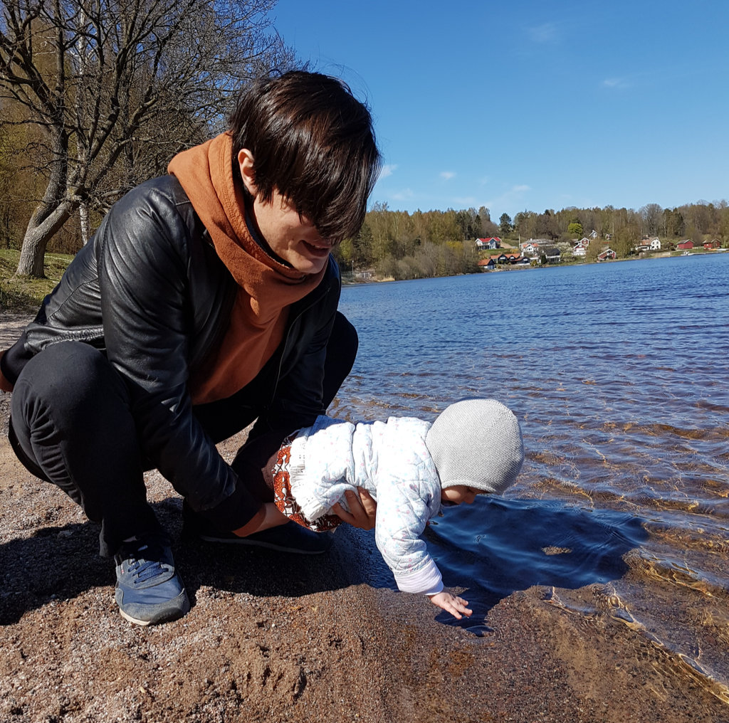 Sanjin with baby Florens at lake Lygnern. Photo: Lisa Sinclair.