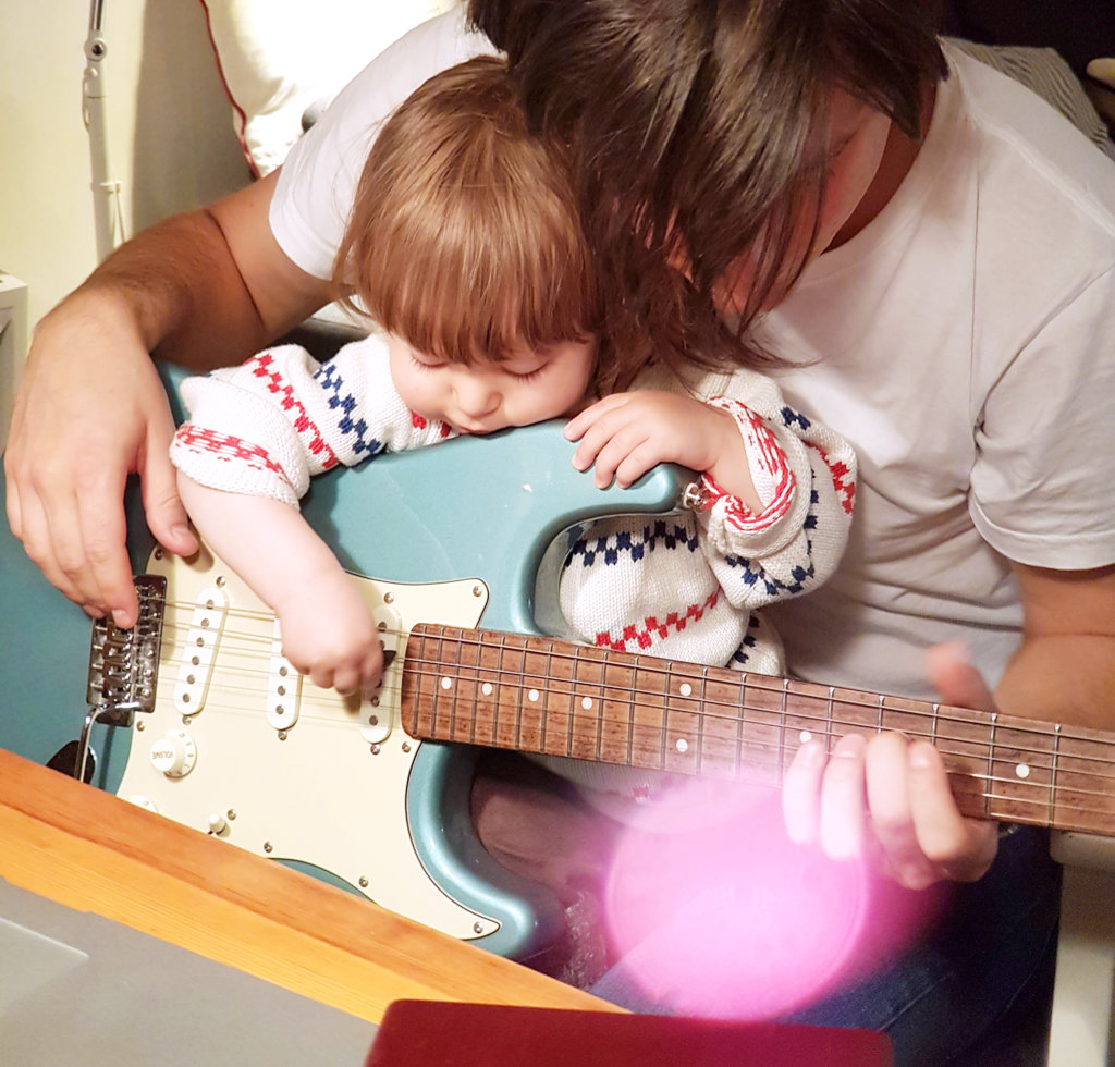 Baby Florens and Sanjin playing electric guitar. Photo: Lisa Sinclair.