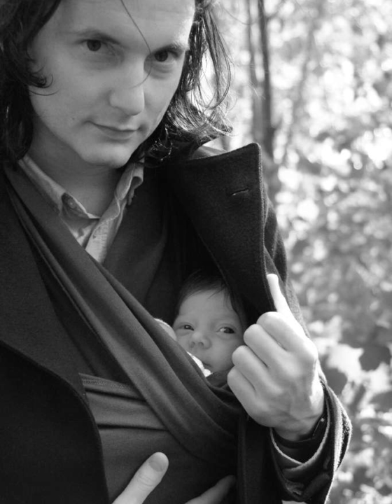 Cozy with a baby sling on a cold Swedish summer