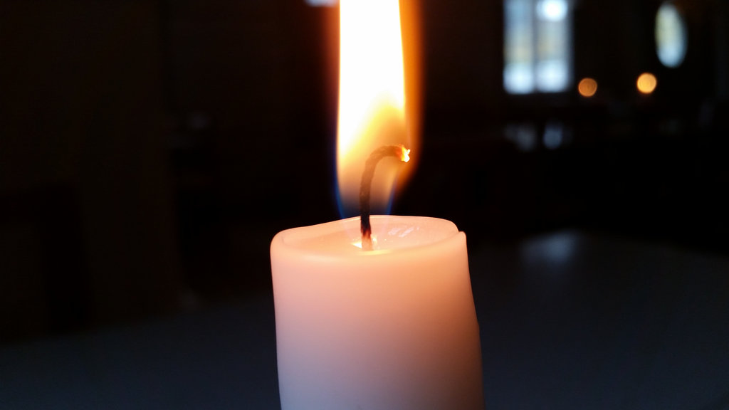 Candle light burning. Photo: Sanjin Đumišić.