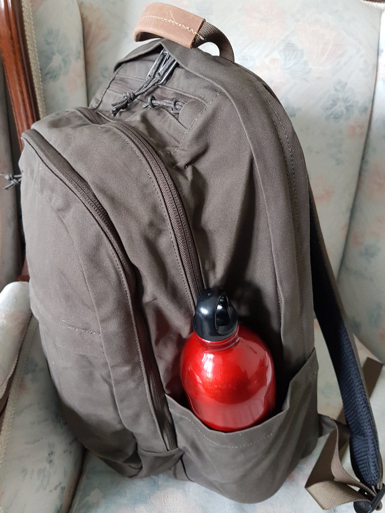 Olive green 28 liter backpack.