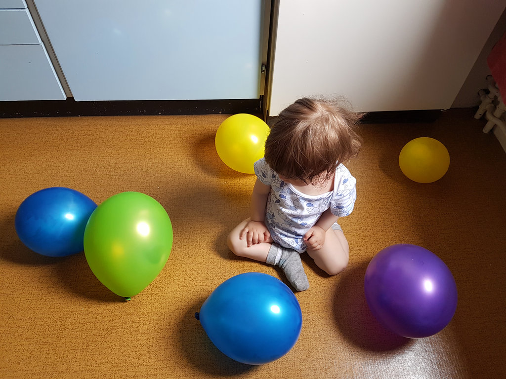 Baby Florens with birthday balloons. Photo: Sanjin Đumišić.