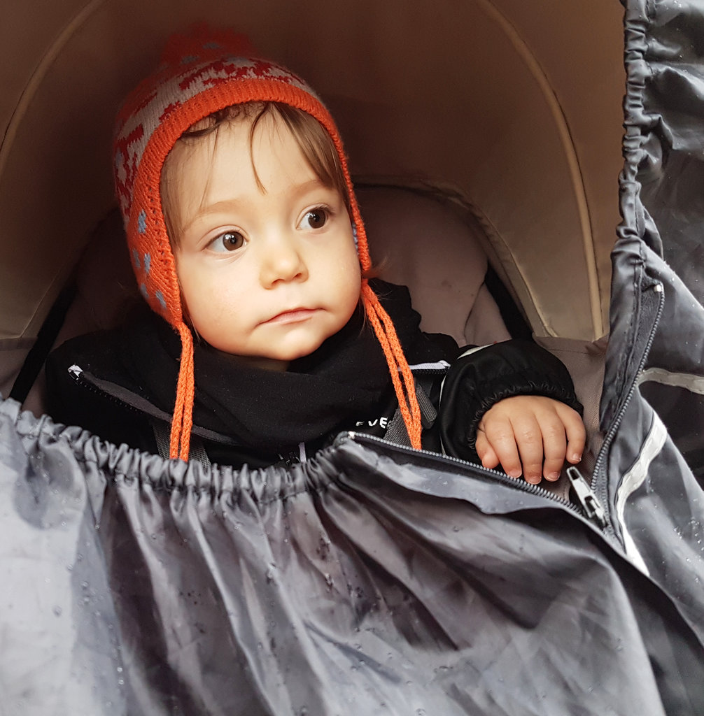 Baby Florens, in stroller on a rainy day. Photo: Sanjin Đumišić.